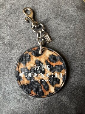 COACH Leopard Print Round Leather Key Fob in Black and Brown